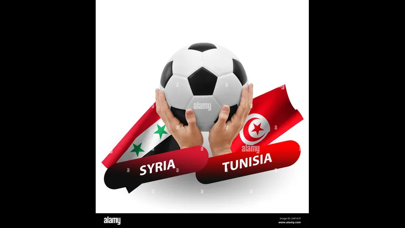 Cầu thủ Tunisia đang tung cú sút mạnh vào khung thành của Syria trong trận đấu